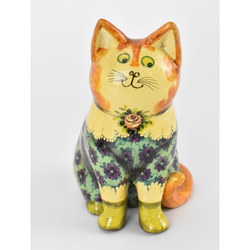 6 - Joan and David De Bethel - A 1970s papier-mâché  model of a seated cat, the underside titled 'Specia... 