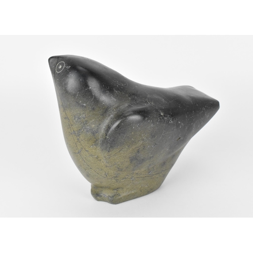 63 - An Inuit steatite stone carving of a bird, by a Cape Dorset artist, circa 1970s/80s, the underside w... 