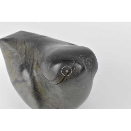 63 - An Inuit steatite stone carving of a bird, by a Cape Dorset artist, circa 1970s/80s, the underside w... 