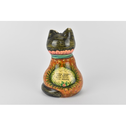 7 - Joan and David De Bethel - A 1960s papier-mâché  model of a seated cat, with bead eyes, the back wit... 