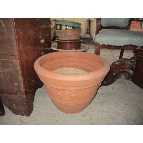 227 - A group of terracotta stoneware pottery and plastic garden planters Location:G