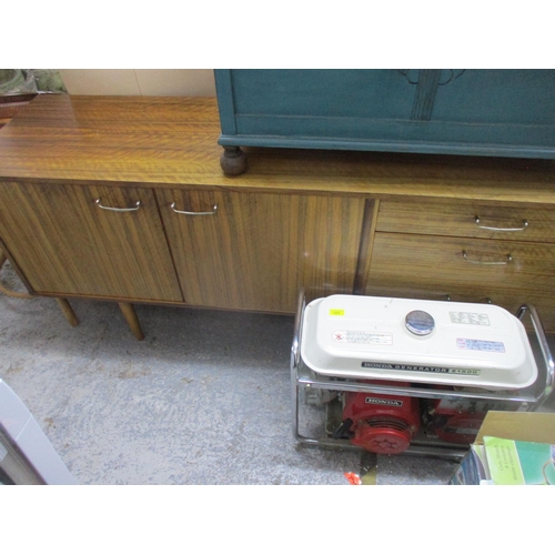 228 - A mid 20th century walnut sideboard on turned legs 74.5cm x 168cm x 46cm Location:G