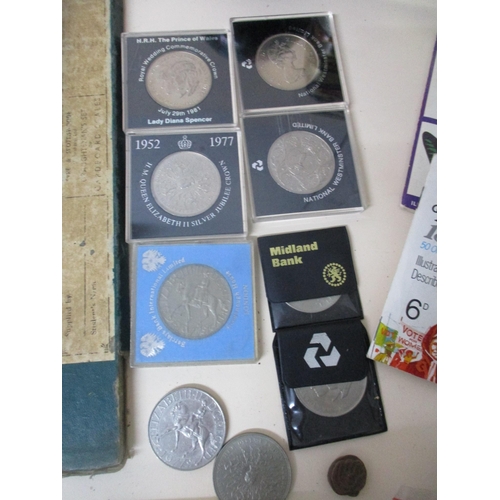 243 - Coins and smoking memorabilia to include an Indian Trident copper coin, commemorative coins, a cocon... 