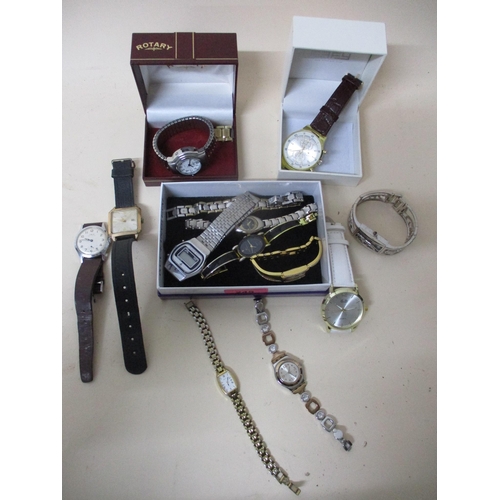 A group of vintage and modern ladies and gents wristwatches to