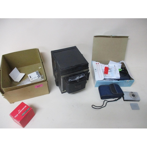 247 - A Sinclair Ltd NS Reflex plate camera, and a boxed Canon IXUS 8015 digital camera with accessories L... 