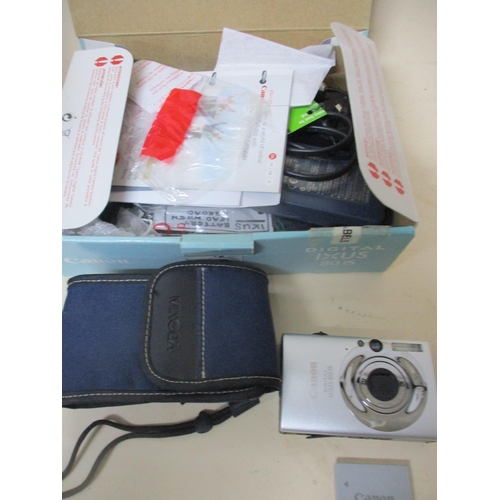 247 - A Sinclair Ltd NS Reflex plate camera, and a boxed Canon IXUS 8015 digital camera with accessories L... 