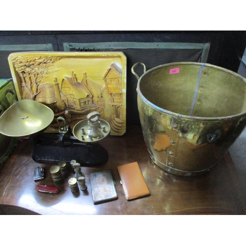 249 - A mixed lot to include a brass twin handled coal/log bucket, cast iron and brass scales with weights... 