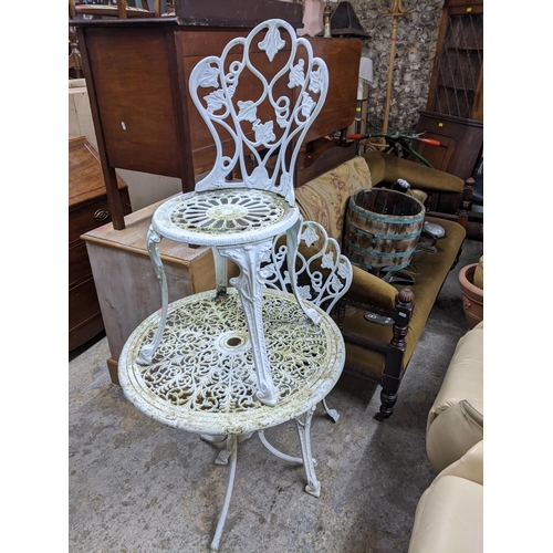 250 - A white painted aluminium garden table and two matching chairs
Location:G