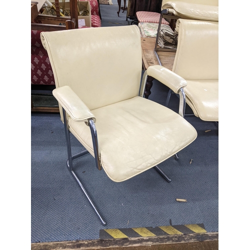 11 - A set of six Boss Design cream leather and chrome dining chairs, together with a Draenert Service gl... 