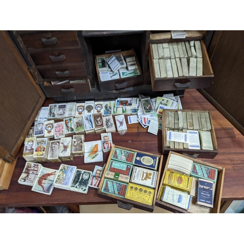 113 - A large collection of cigarette and tea cards to include Churchman, Wills, John Player and others, c... 