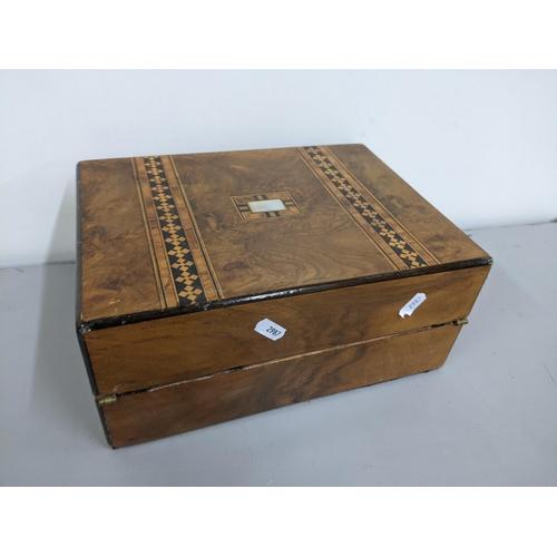 154 - A Victorian walnut Tunbridge ware box having parquetry inlaid and inset with mother of pearl to the ... 