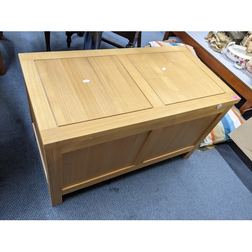 155 - A modern light oak panelled blanket chest, 50.5cm h x 85.5cm w
Location:A2F