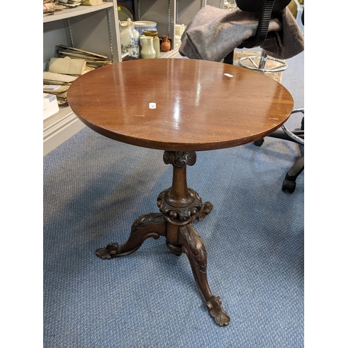 179 - A Victorian mahogany tripod occasional table having a later top and on carved legs 67.5cm h x 47cm w... 