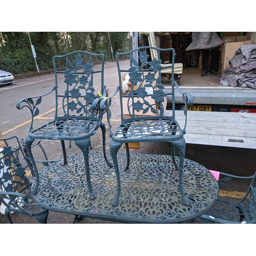 188 - An aluminium garden set of furniture to include dining table 67cm h x 140cm w x 81cm d, with four ch... 