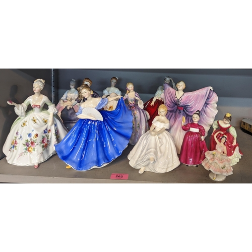 262 - A collection of 12 figures of ladies, mostly Royal Doulton examples, to include Isadora, Diana, Vani... 