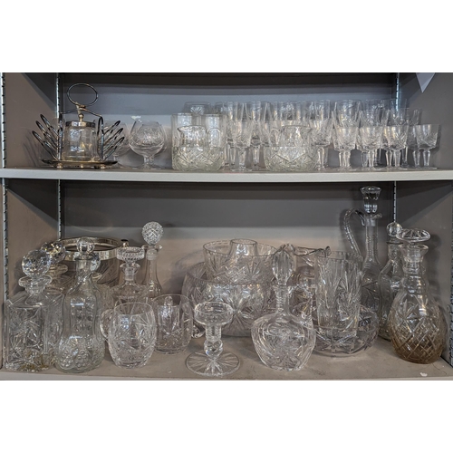 266 - A quantity of mixed domestic glassware to include glasses, bowls, footed bowl, jugs, decanters and o... 