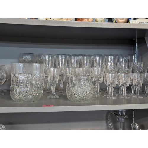 266 - A quantity of mixed domestic glassware to include glasses, bowls, footed bowl, jugs, decanters and o... 