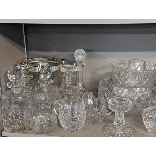 266 - A quantity of mixed domestic glassware to include glasses, bowls, footed bowl, jugs, decanters and o... 