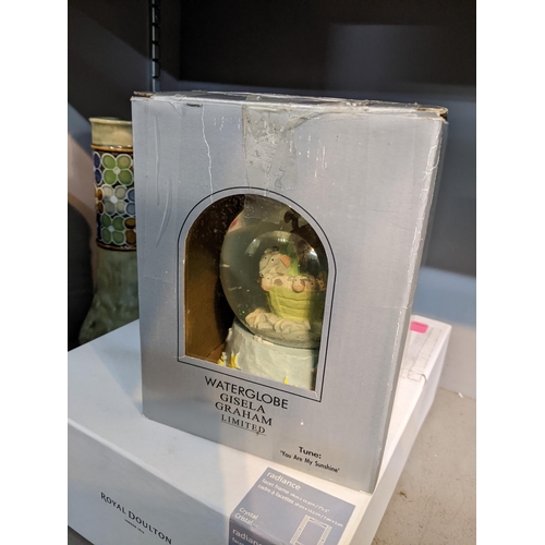27 - A Royal Doulton photo frame 12.5cm x 17.5cm, together with two Royal Doulton stoneware vases and a b... 