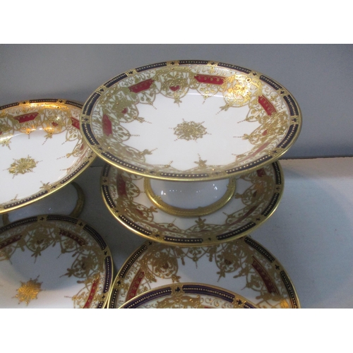 30 - A Noritake part dinner service having heavy gilded decoration on a white ground Location:9.6