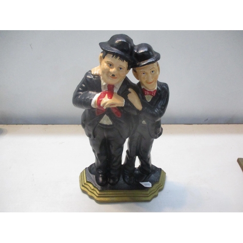 31 - *THIS LOT HAS BEEN WITHDRAWN**
A Leonardo Collection cast iron Laurel and Hardy doorstop, together w... 