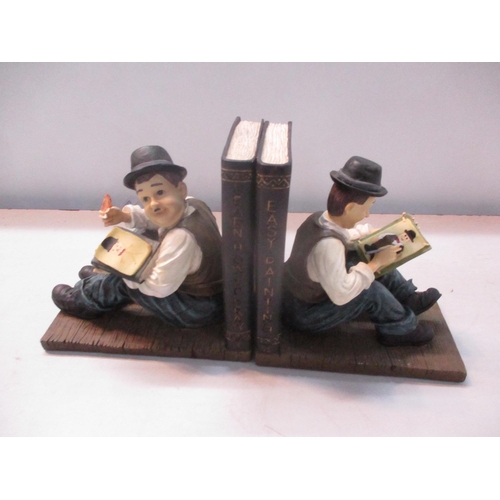 31 - *THIS LOT HAS BEEN WITHDRAWN**
A Leonardo Collection cast iron Laurel and Hardy doorstop, together w... 