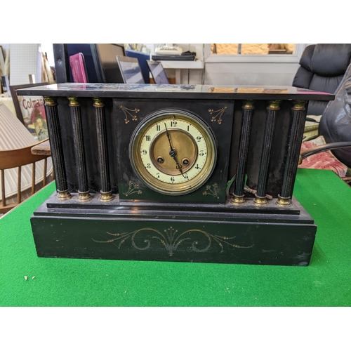 396 - A late 19th century black marble cased mantel clock minus figure, 25cm x 42cm 
Location:SR