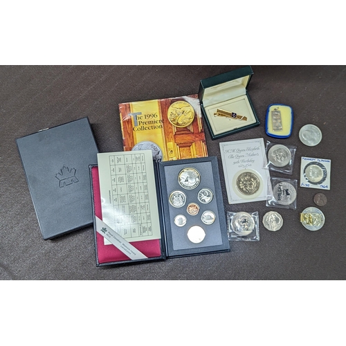 417 - A group of coins to include a 1996 Canadian proof set comprising seven coins to include silver 1 dol... 