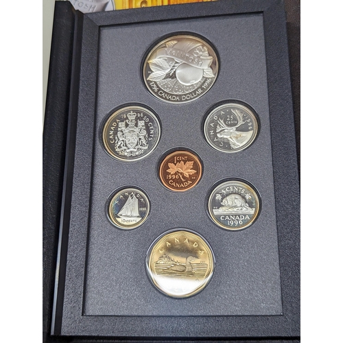 417 - A group of coins to include a 1996 Canadian proof set comprising seven coins to include silver 1 dol... 