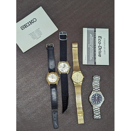 418 - A group of four wristwatches to include a Citizen Eco-Drive, Tasso Automatic, MuDu Automatic and one... 