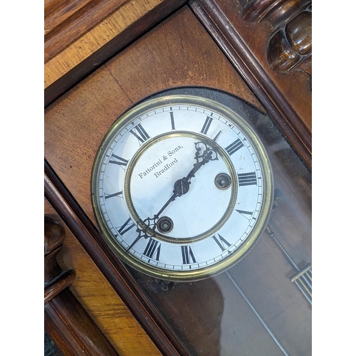 449 - A reproduction Vienna style regulator clock, retailed by Fattorini & Sons, Bradford
Location:LAB