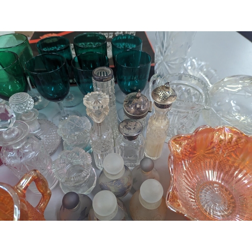 472 - A mixed group of glassware to include Royal Doulton crystal, Carnival glass, silver topped dressing ... 