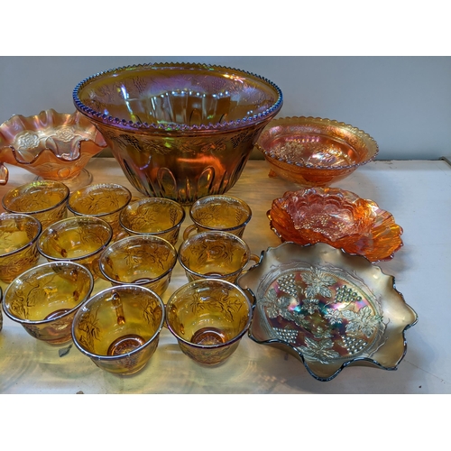 479 - Carnival glass to include punch bowl, twelve cups and seven dishes
Location:9.6