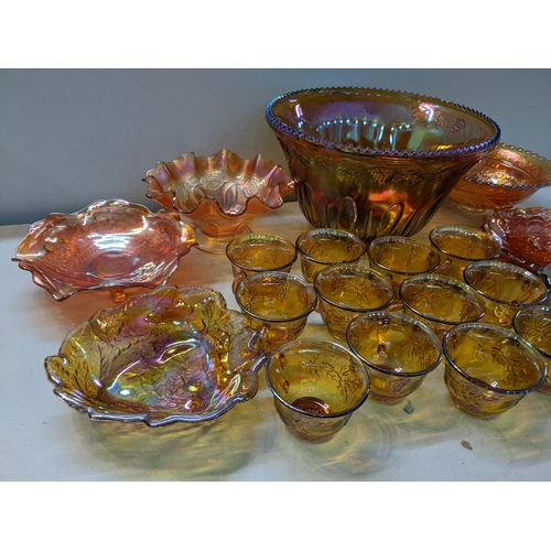 479 - Carnival glass to include punch bowl, twelve cups and seven dishes
Location:9.6