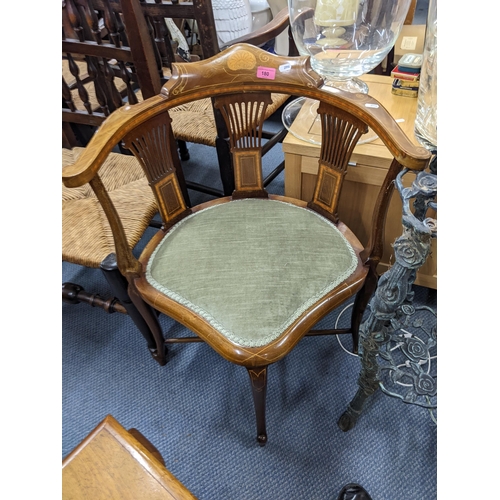 180 - An Edwardian mahogany armchair, together with a mahogany coffee table Location:A3F