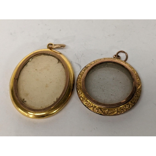 408 - Two 9ct gold pendants to include one with an embossed frame, total weight 11.6g
Location: CAB3