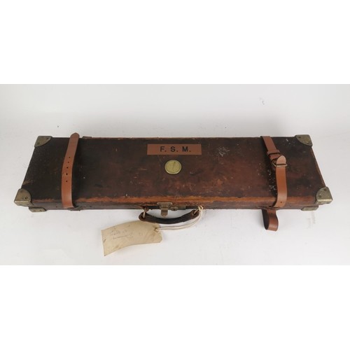 429 - A brass-bound leather gun case by Holland & Holland, London, for hammerless ejector gun, the case of... 