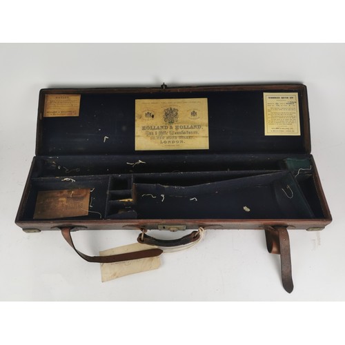 429 - A brass-bound leather gun case by Holland & Holland, London, for hammerless ejector gun, the case of... 