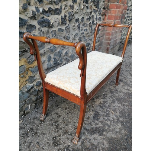 430 - A 19th century cherry wood swan neck window seat, upholstered with a cream vine leaf pattern fabric,... 