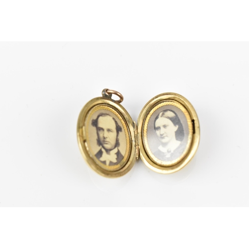 431 - A collection of three gold photo lockets, comprising a circular one with engine turned design, stamp... 