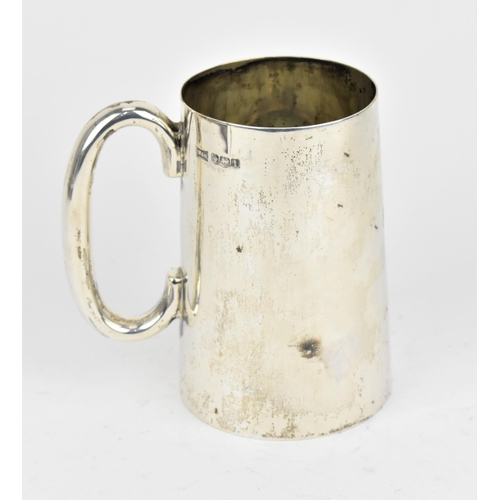 436 - A George V silver tankard by Walker & Hall, Sheffield 1928, of tapered cylindrical form with hoop ha... 