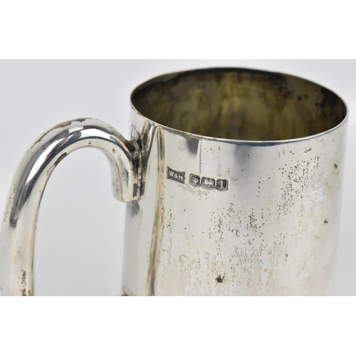 436 - A George V silver tankard by Walker & Hall, Sheffield 1928, of tapered cylindrical form with hoop ha... 