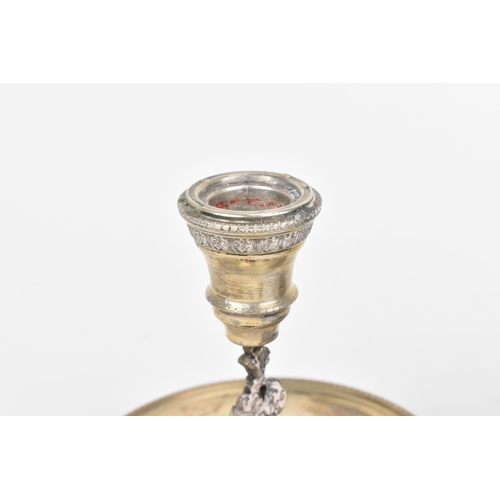 440 - An Italian silver chamberstick, with c-scroll and leaf cast nozzle, fluted capital and moulded shell... 