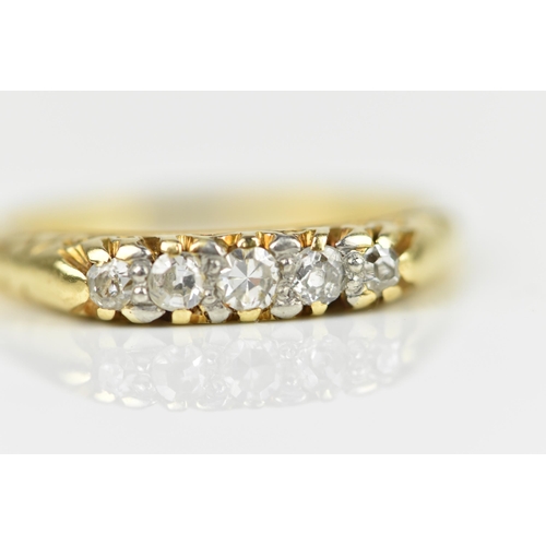 442 - An 18ct yellow gold five stone diamond ring, with graduated stones to the centre, all claw set in ca... 