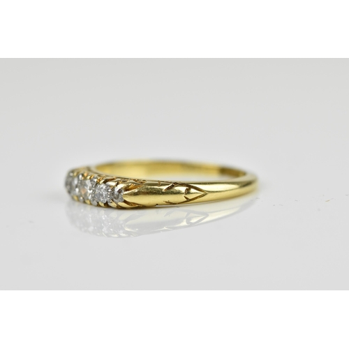 442 - An 18ct yellow gold five stone diamond ring, with graduated stones to the centre, all claw set in ca... 