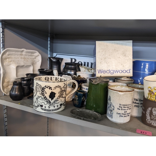 411 - Mixed ceramics to include Wedgwood, Carl Toms mugs and other, mixed commemorative mugs, Poole potter... 