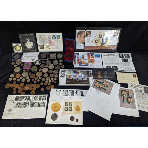 496 - A group of mixed coinage and First Day covers to include a selection of Rhodesian coins, commemorati... 