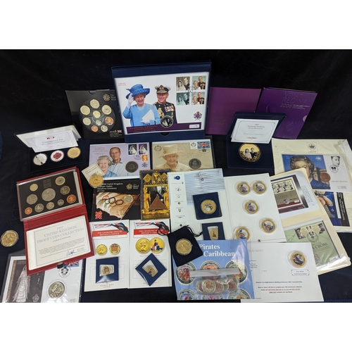 486 - A mixed lot of commemorative coins to include crowns, First day covers, the 2007 Diamond Wedding 5oz... 