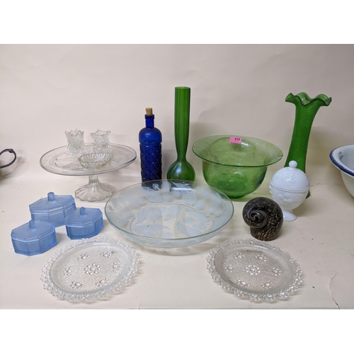 514 - A selection of Arts & Crafts, Art Nouveau, and later glassware to include a Clutha style green glass... 