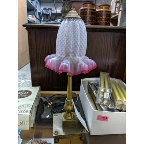 518 - A mixed lot to include a brass table lamp with moulded and cranberry frosted glass shade, various ca... 